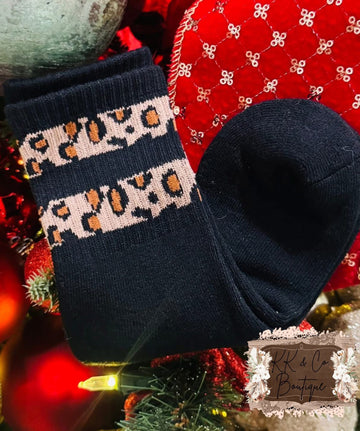 Black fuzzy socks leopard stripes